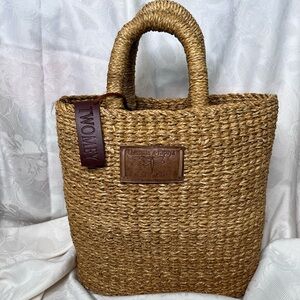 Papaya and Chestnuts woven works wicker tote.